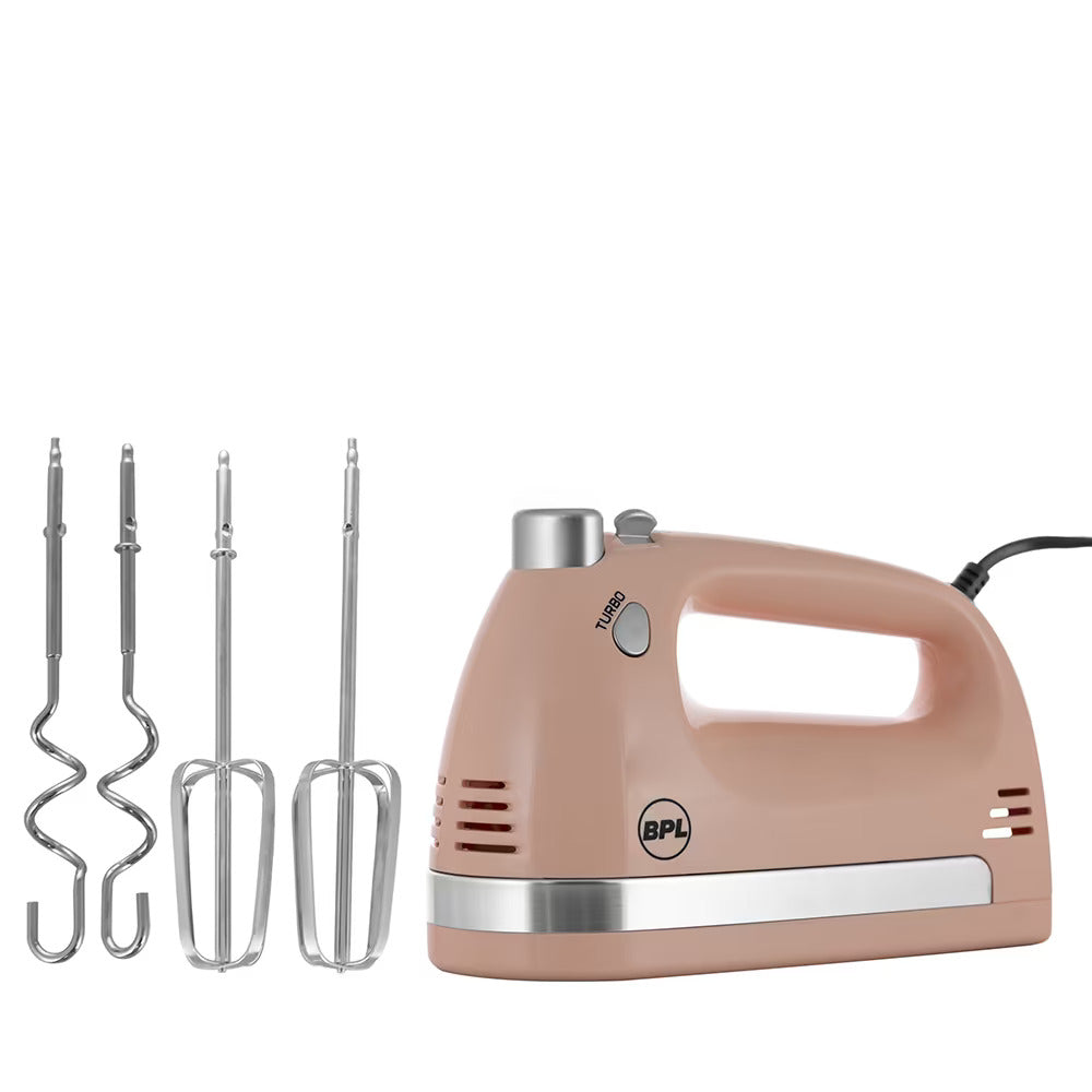 Beige hand mixer with attachments on a white background