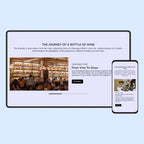 Computer monitor and smartphone displaying a wine-themed website on a light blue background