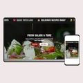 Digital display and smartphone showing a salad menu with branding and navigation elements.