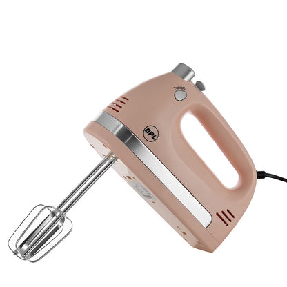 Pink hand mixer with silver whisk attachment on a white background